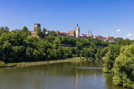 Bad Wimpfen with a view of the old church and the historic city wall over the Neckar river