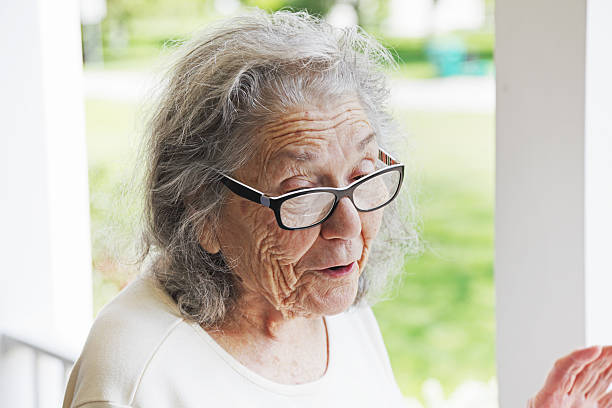 istock Cheerful Senior Woman Talking 187063525