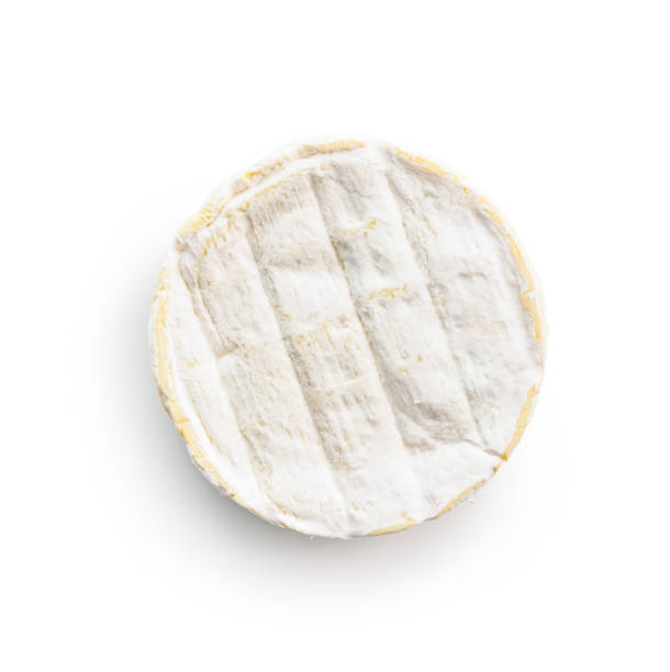 istock Brie type cheese with white mold. French camembert cheese isolated on white background. 1870636034