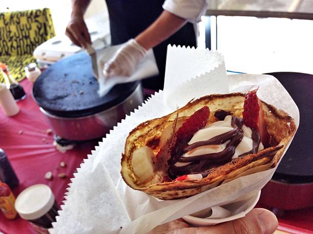 Dessert Crepes being made stock photo