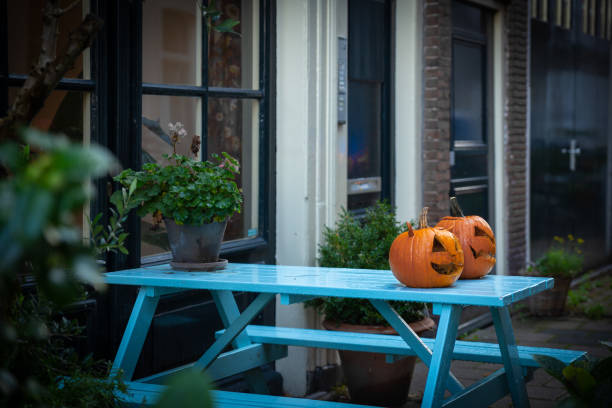 Halloween pumpkin on an outdoor table in Amsterdam