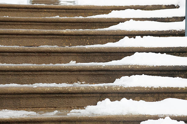 istock steps to stairway in winter snow ice Germany 187065439