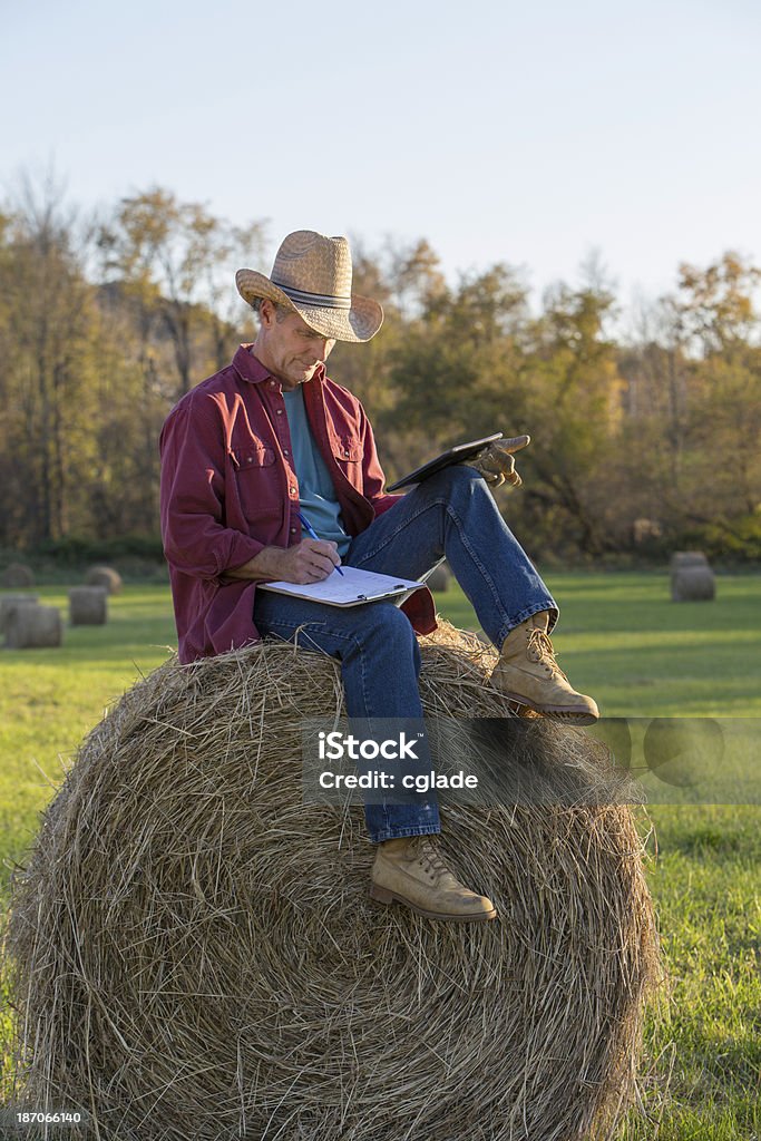 Travailleur Ranch de travail avec Tablette numérique - Photo de Adulte libre de droits