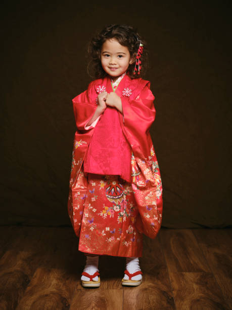 A multiracial Japanese girl wearing a kimono for a shichigosan portrait.