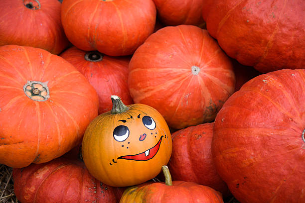 istock Painted grimace on pumpkin for Halloween 187066634
