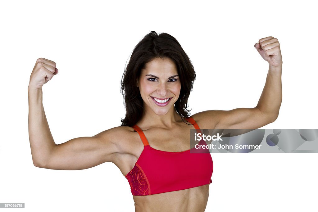 Женщина изгиб ее мышцы - Стоковые фото 20-24 года роялти-фри