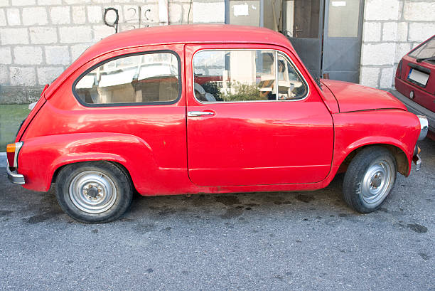 istock Little red car in Slovenia 187067255