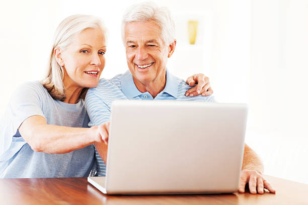 istock Senior Couple With Laptop 187067758