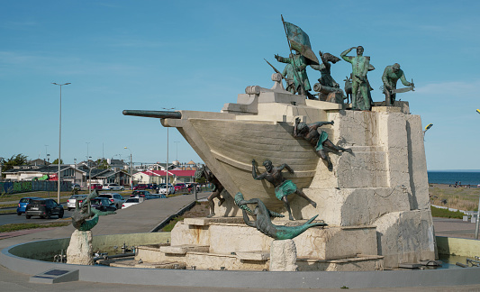 Punta Arenas, Chile - October 23, 2023: Monumento A Tripulantes Galeta Ancud in Punta Arenas, Chile. Monument depicts the journey of expedition members to the Strait of Magellan in 1843.