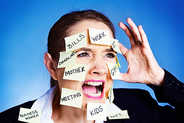 istock Infuriated woman covered in task reminders has had enough! 187067838