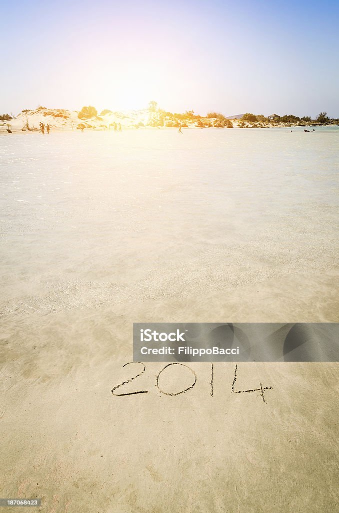 Nuovo anno 2014 sulla spiaggia - Foto stock royalty-free di 2014