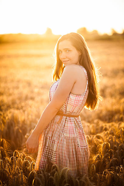 istock Woman Standing In Wheat Field 187068622