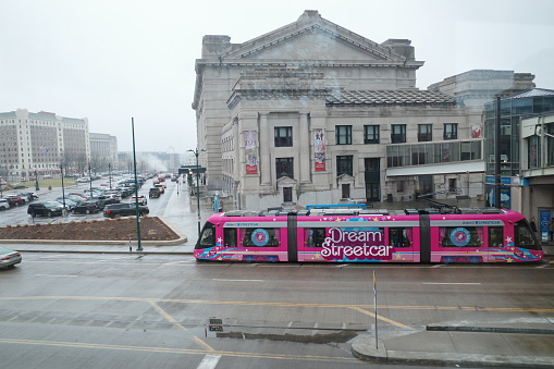 Image of a public city bus in motion. Shot in downtown Portland Oregon, panning effect used to show bus is in motion.