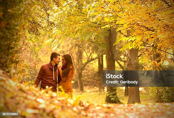 Passionate Love In The Autumn Park Stock Photo - Download Image Now - Adult, Adults Only, Autumn