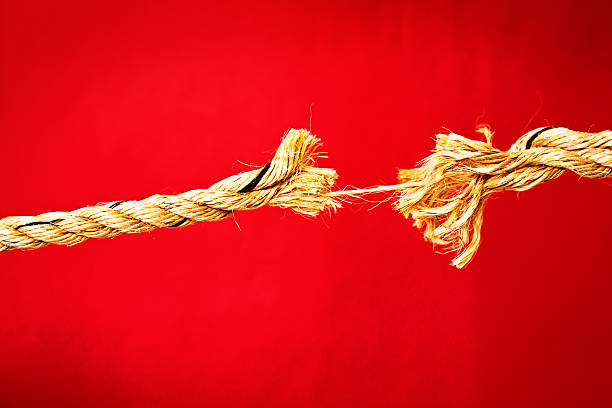 istock Final strand of rope about to snap 187071207
