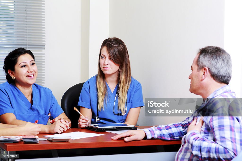 Healthy Lifestyle Nurses talking adult patients. Adult Stock Photo