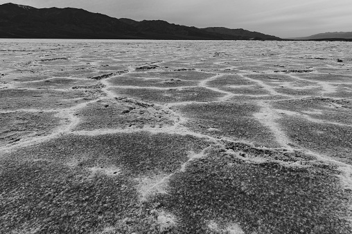 Cloudy sky over Death Valley salt lake