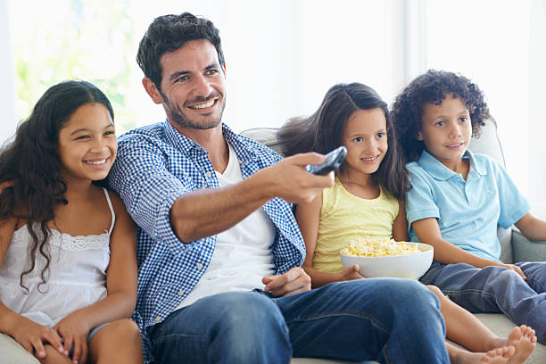 istock Settling into to a good movie 187076376