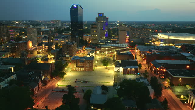 Lexington Kentucky urban architecture in city downtown at night. Panoramic view of business district skyline with high-rise buildings.