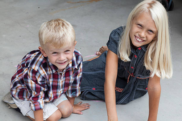 istock Cute Blonde Brother and Sister 187077260