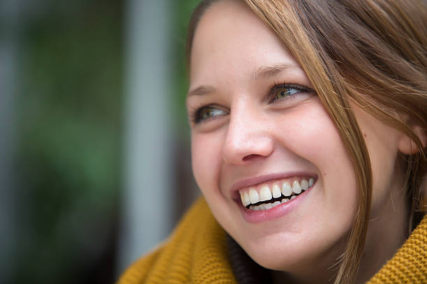 istock Young woman smiling 187077379