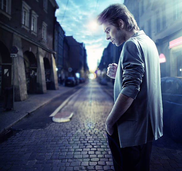 istock Thoughtful handsome man in downtown at the evening 187077541