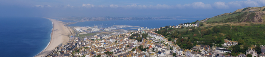 an aerial view of chesil beach isle of portland and weymouth, dorset uk.