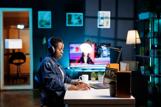 istock Woman focuses on using her laptop 1870791042