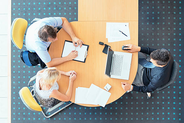 istock Couple Signing the Sales Contract 187080127