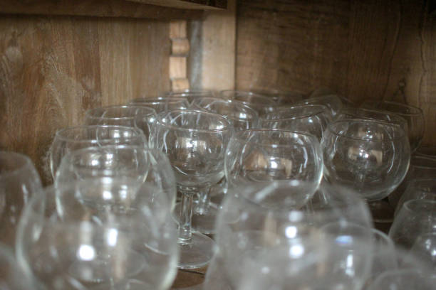 unearthing vintage glasses in a cupboard