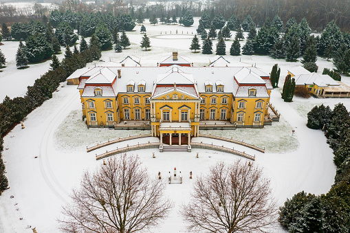 Aerial view about the Csebi-Pogany Castle covered by fresh snow