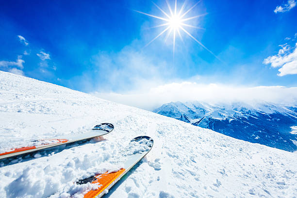 Skis on ski resort slope