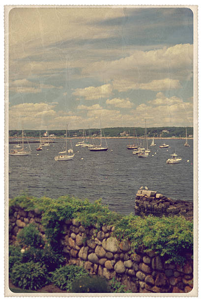 Retro-styled postcard of boats in Sandy Bay off the coast of Rockport, Massachusetts -- all artwork is my own...For hundreds of similar vintage postcards from around the world, click the banner below.
