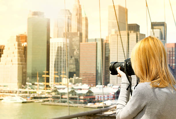 istock Young woman Filming Manhattan 187082200