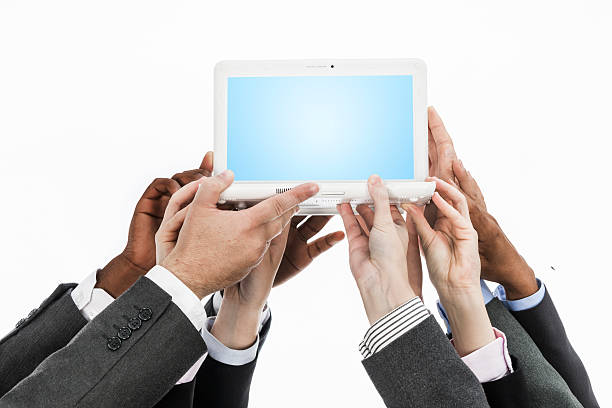 istock Business people holding laptop 187082276