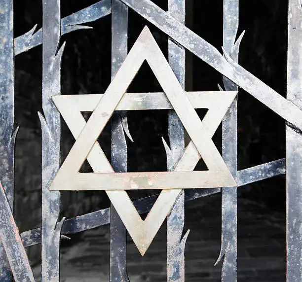 Photo of Jewish star on a Fence