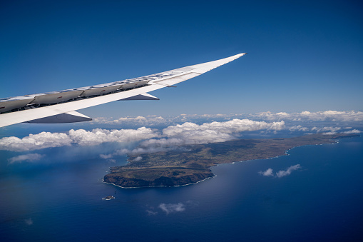 Easter Island, Chile - October 30, 2023: Photographing Easter Island, Chile, with a mobile phone from an airplane window