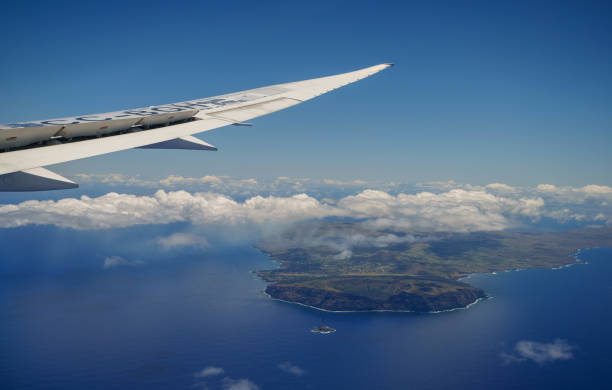 Easter Island, Chile - October 30, 2023: Photographing Easter Island, Chile, with a mobile phone from an airplane window