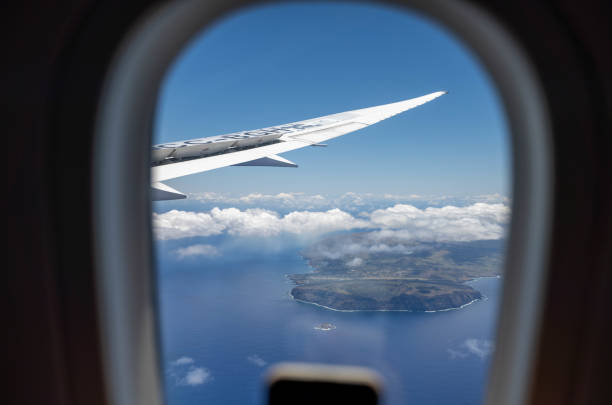 Easter Island, Chile - October 30, 2023: Photographing Easter Island, Chile, with a mobile phone from an airplane window