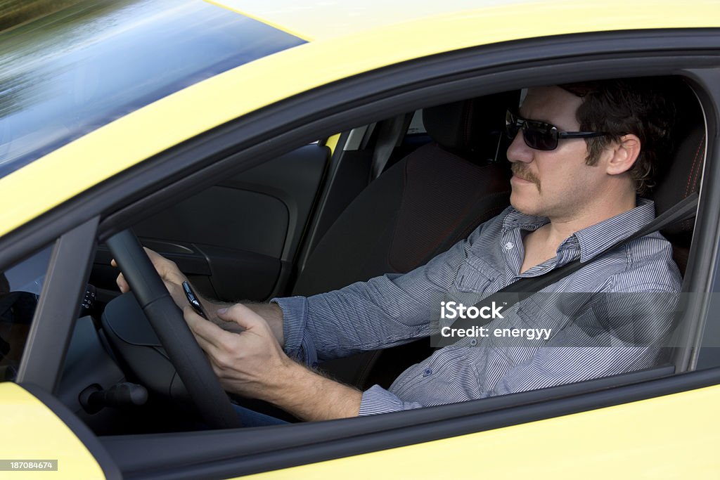 Texting while driving 30-39 Years Stock Photo