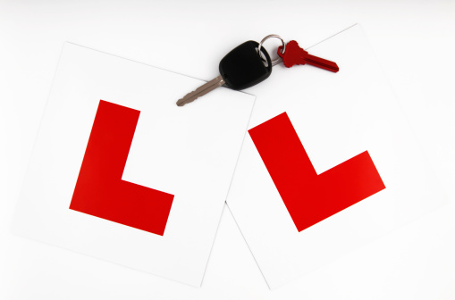 Learner Plates with Car Keys on White Background