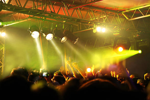 istock Raising hands at a music concert 187086723