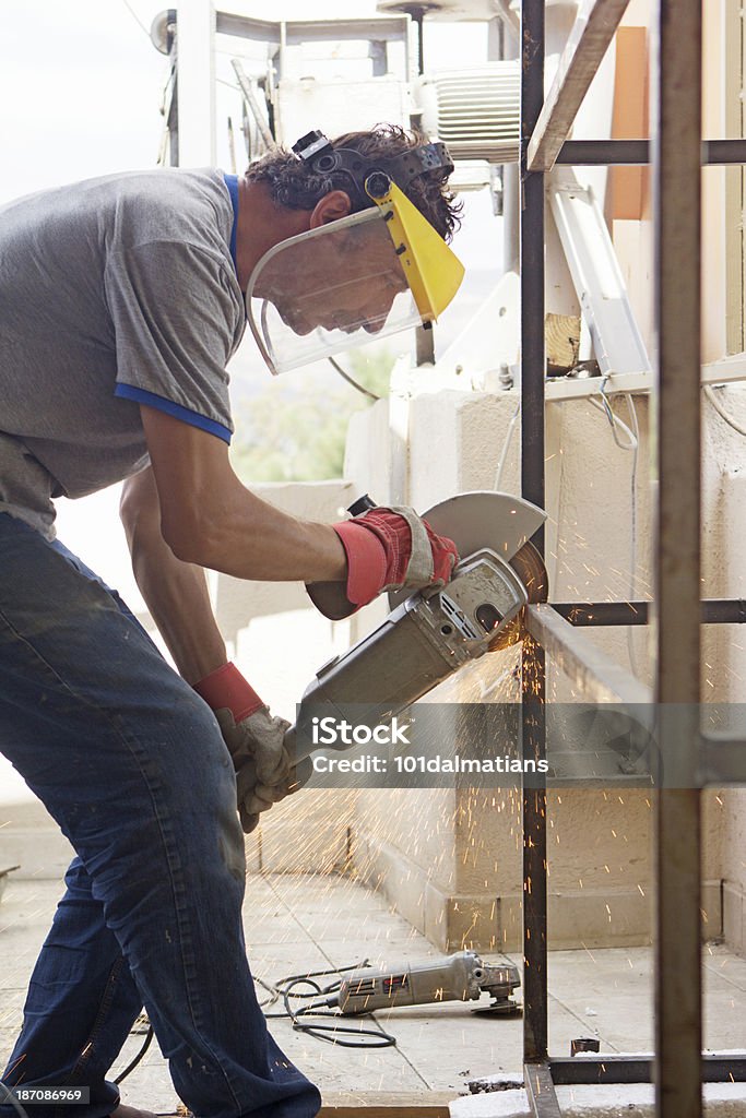 Grinder Worker cutting metal with grinder Accuracy Stock Photo