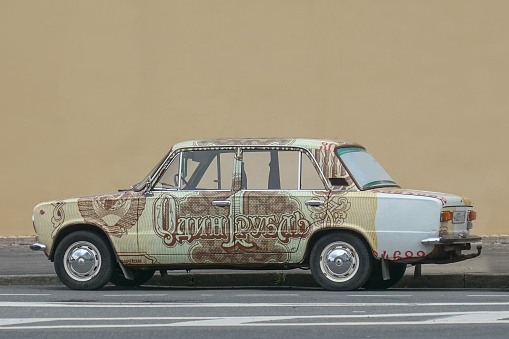 Airbrush of the Soviet banknote of one ruble is painted on the LADA 1200 (VAZ 2101 (21013) 