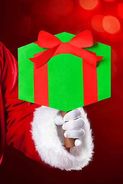 istock Christmas present sign in Santa's hand 187088079