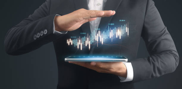 istock Businessman plan graph growth and increase of chart positive indicators,tablet in hand 1870882970