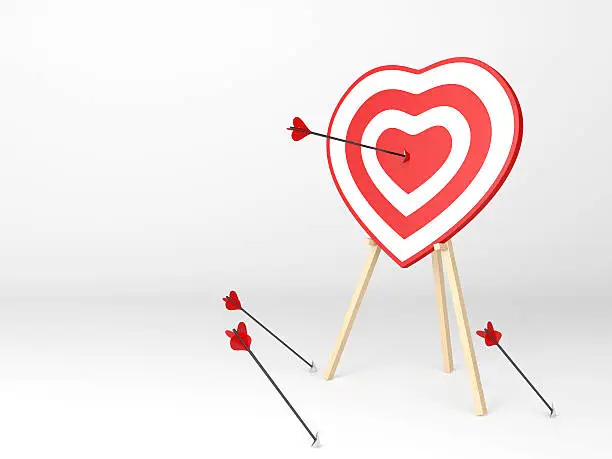 The arrow hit the center of the target in the form of heart