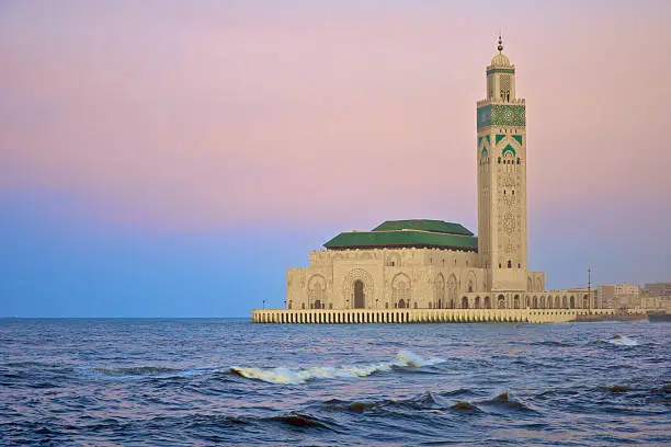Sunset image of the King Hassan II Mosque on the Atlantic Coast of Casablanca in Morocco