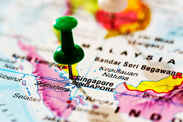 istock Singapore marked by green pushpin on map 187089139