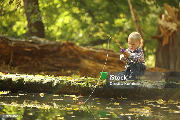 Kid Catches A Fish Stock Photo - Download Image Now - Baby - Human Age, Lake, Autumn